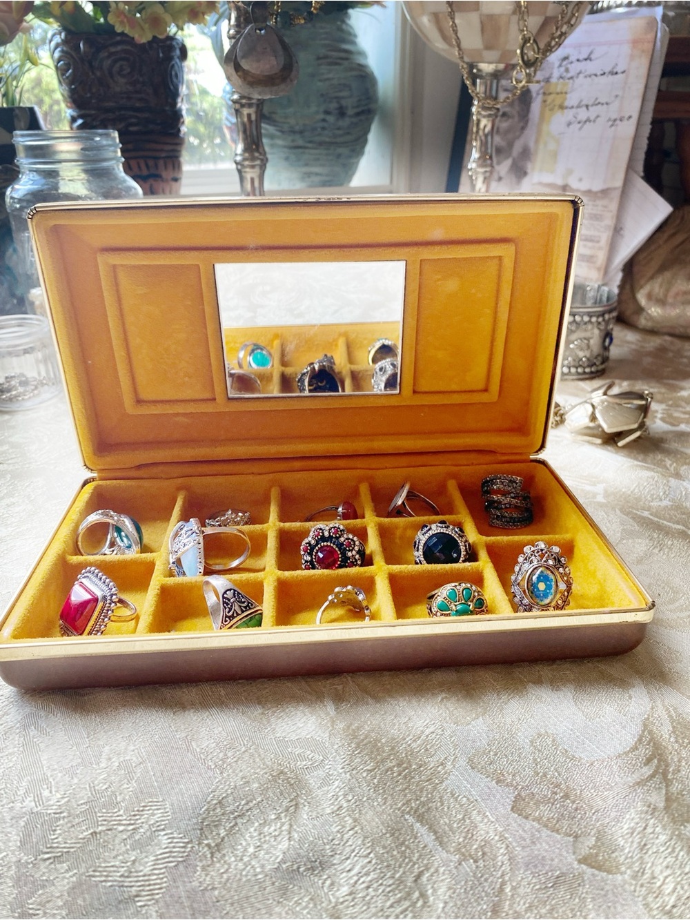 Lot of vintage style costume rings with box.